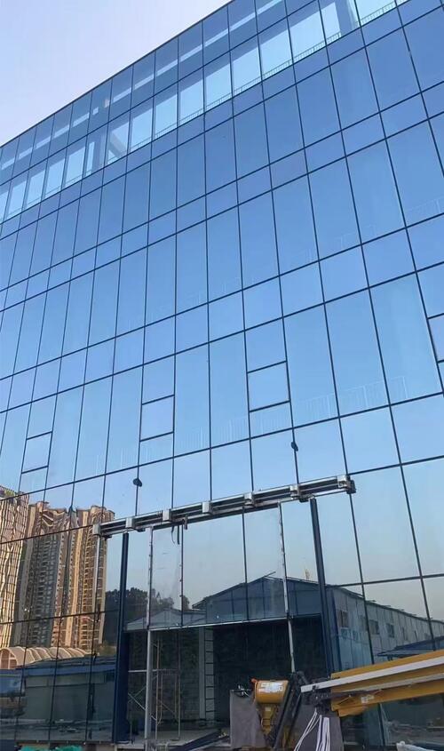 latest company news about Welons Completes Large Blue Reflective Laminated Glass Curtain Wall Project for Commercial Office Building